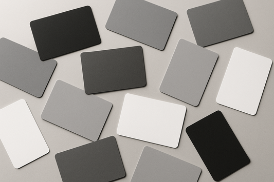 monochrome blank cards on table